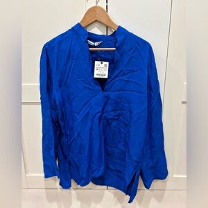 Beautiful bright blue blouse